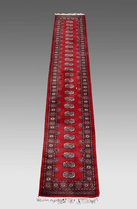 Appraisal: HAND TIED BOKHARA CARPET RUNNER Approx ' '' x '