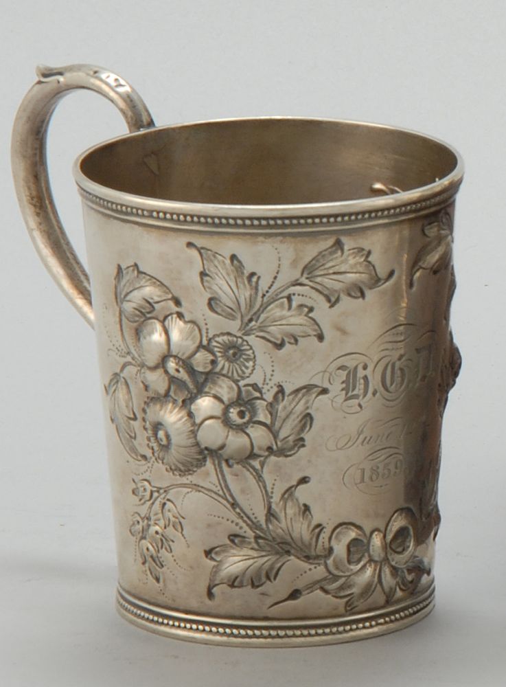 Appraisal: AMERICAN SILVER CHILD'S MUG With chased floral decoration Beaded rim