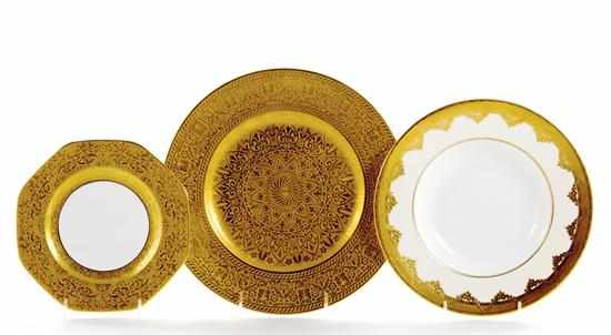 Appraisal: Gilt-decorated dinner plates and bowls Minton soup plates for Tiffany