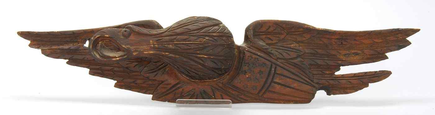 Appraisal: BELLAMY-STYLE CARVED WOODEN EAGLEAmerican th CenturyWith head bent to left