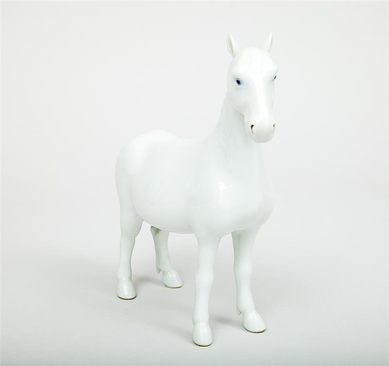 Appraisal: Hirado Glazed Porcelain Figure of a Horse and a Carved