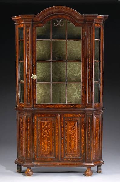 Appraisal: A Dutch Baroque style walnut and marquetry vitrine cabinet part