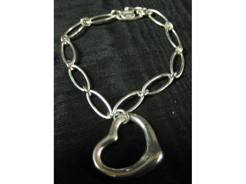 Appraisal: TIFFANY CO BRACELET Sterling oval link chain bracelet with dangling