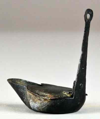 Appraisal: American Primitive Wrought Iron Whale Oil LampBlack boat shaped with