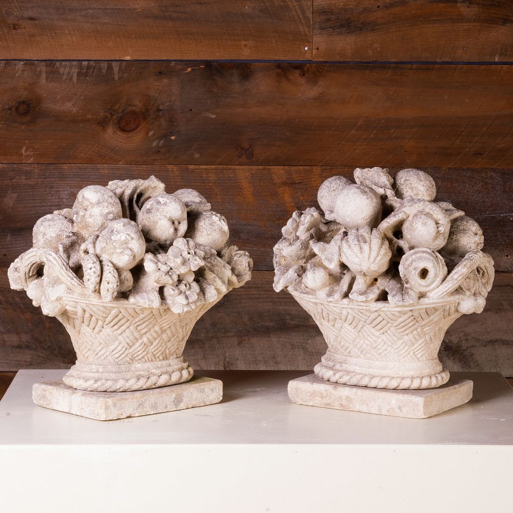 Appraisal: Two Cast Stone Fruit Filled Baskets Stamped Made in Italy