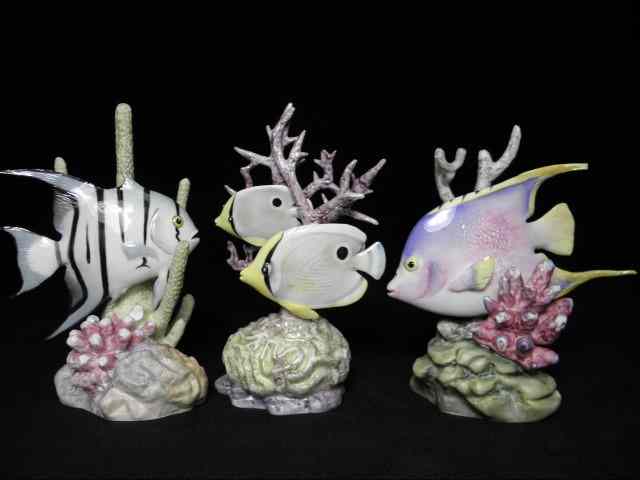 Appraisal: Three Royal Worcester porcelain fish modelled after Ronald Van Ruyckevelt