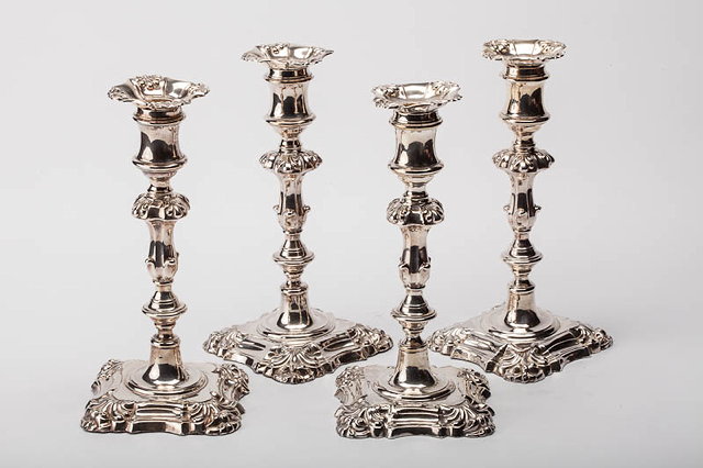 Appraisal: A SET OF FOUR SILVER WILLIAM IV CANDLESTICKS with acanthus