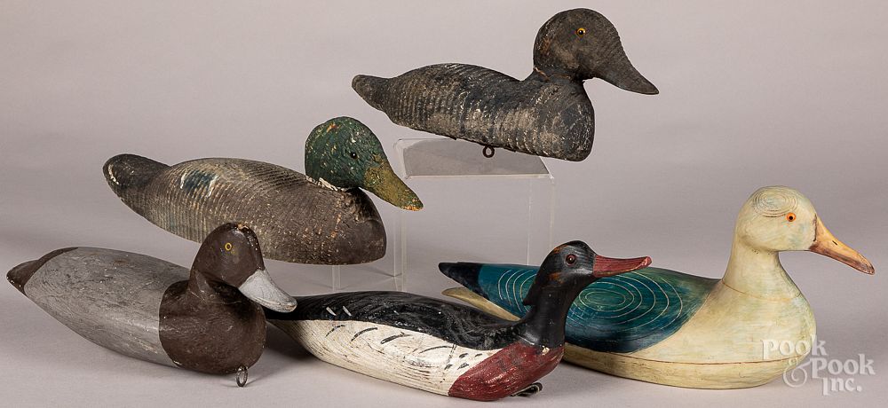 Appraisal: Four carved and painted duck decoys Four carved and painted