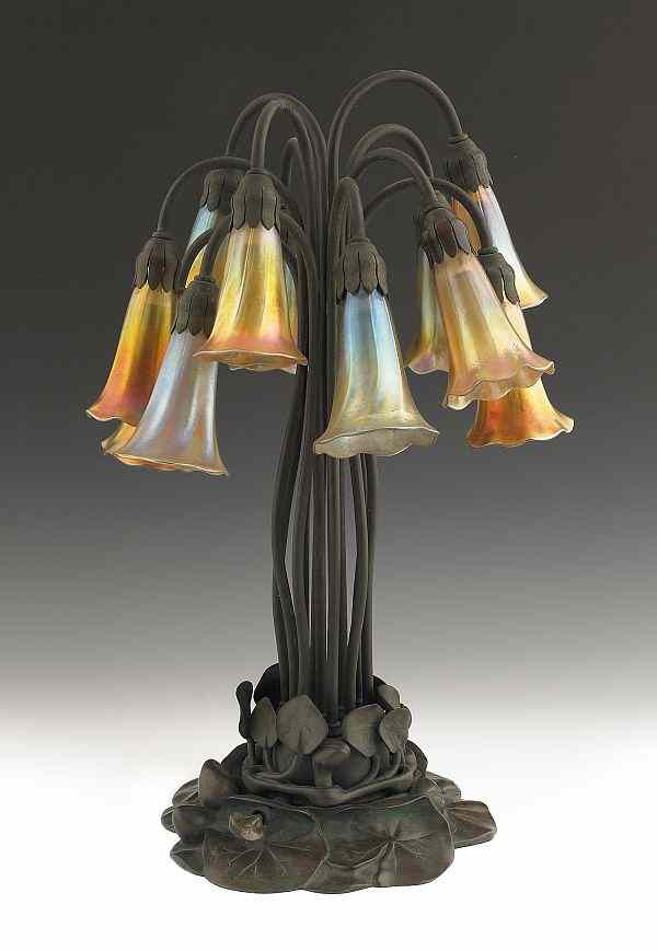 Appraisal: Tiffany Studios twelve-light lily lamp with Favrile glass shades signed