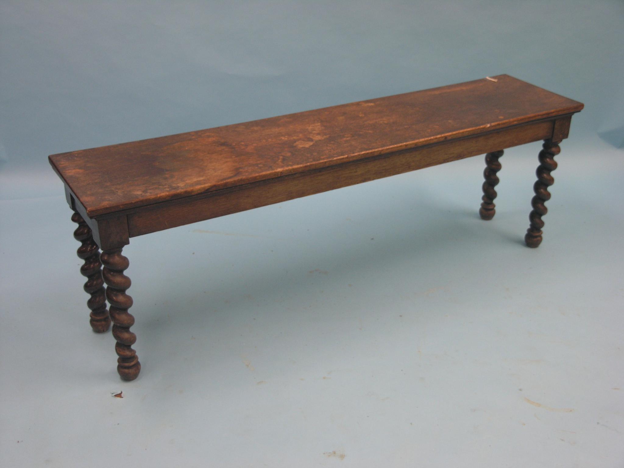 Appraisal: A Victorian dark oak hall bench on barley-twist legs ft