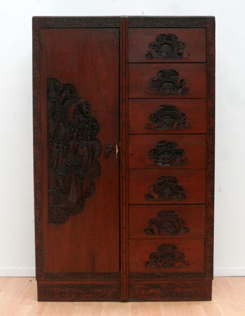 Appraisal: A heavily carved Shanghai Art Deco wardrobe circa cms wide