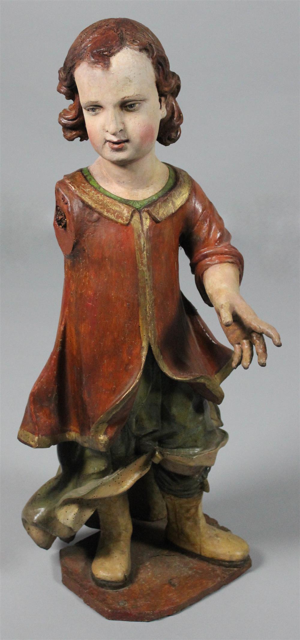 Appraisal: POLYCHROME WOOD STANDING FIGURE OF A PUTTO PROBABLY ITALIAN TH