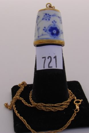 Appraisal: Denmark porcelain thimble with blue flower on chain