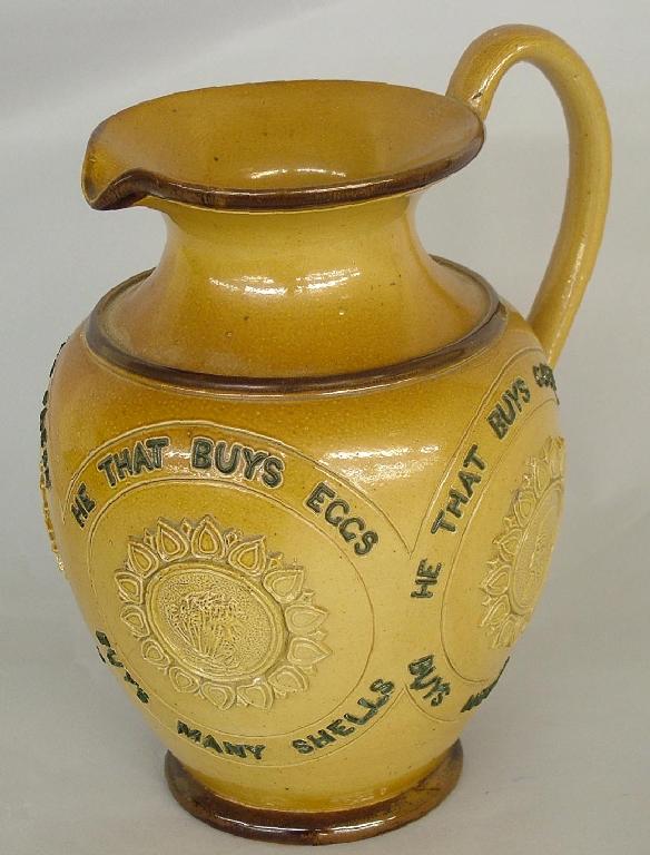 Appraisal: Doulton Lambeth stoneware ovoid jug with applied portrait medallions and