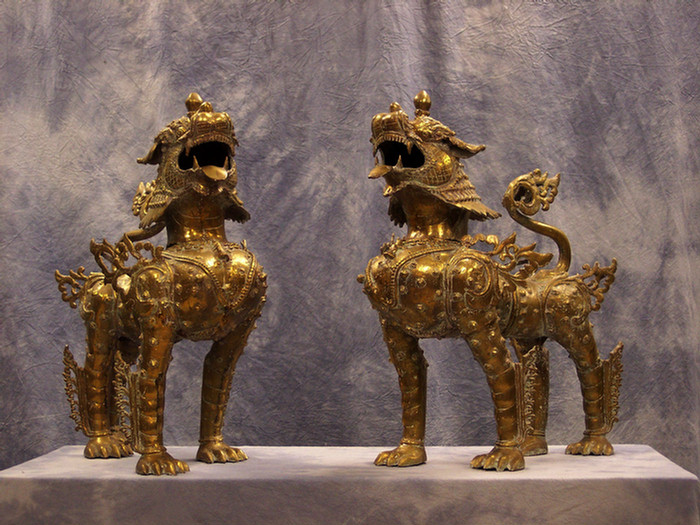 Appraisal: Pr brass foo dogs l h Estimate -