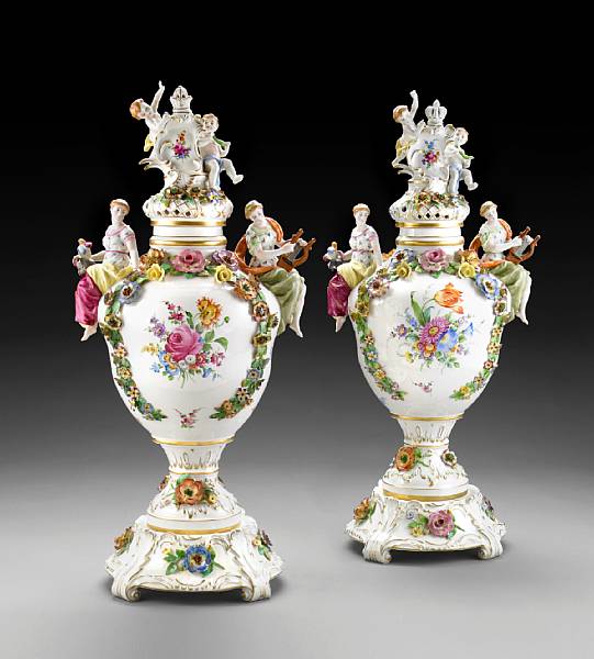 Appraisal: A pair of German porcelain covered urns th century Each