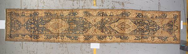 Appraisal: A Northwest Persian runner Northwest Persia circa size approximately ft