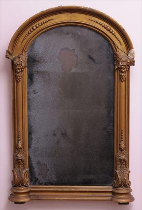 Appraisal: RENAISSANCE REVIVAL GILTWOOD OVERMANTEL MIRROR The arched mirror plate in