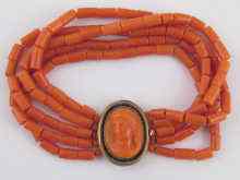 Appraisal: A five strand coral bracelet with a yellow metal tests