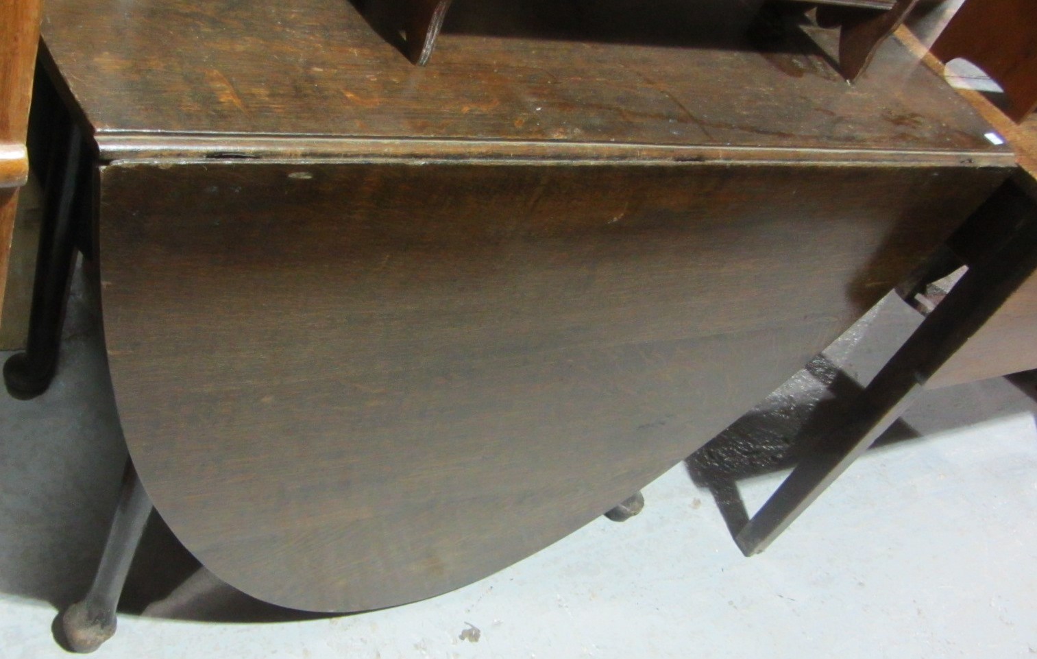 Appraisal: A George III and later oak drop flap table