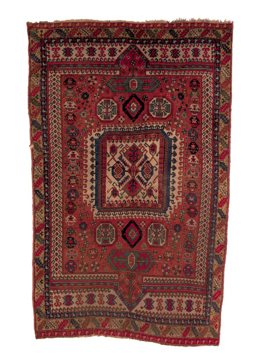 Appraisal: Kazak carpet ca with a central medallion on a red