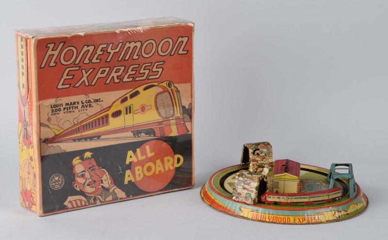 Appraisal: Marx Honeymoon Express Tin Litho Toy Included is the original