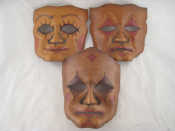 Appraisal: Three hand coloured leather masks the largest measuring approx x