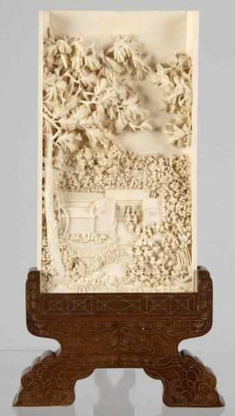 Appraisal: Large Ivory Plaque Description Depicts a village scene with people