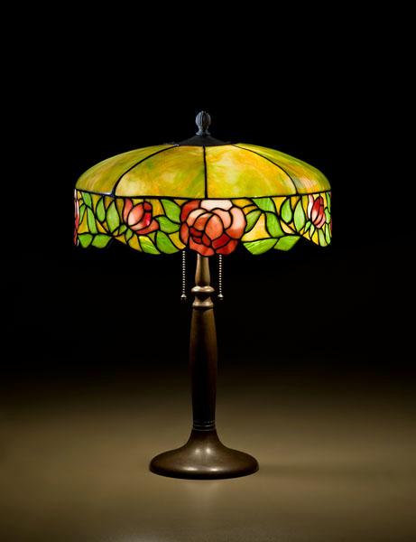 Appraisal: LEADED GLASS TABLE LAMP WITH HANDEL BASE American ca A