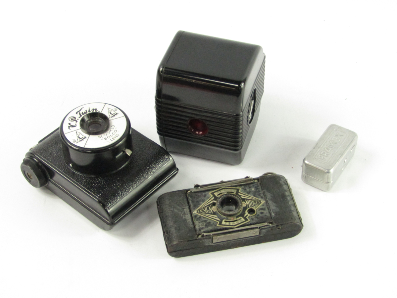 Appraisal: An Ensign Midget camera Baby Brownie camera and a VP