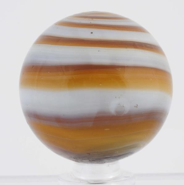 Appraisal: A Large Navarre Horizontal Swirl Hard to find size amber