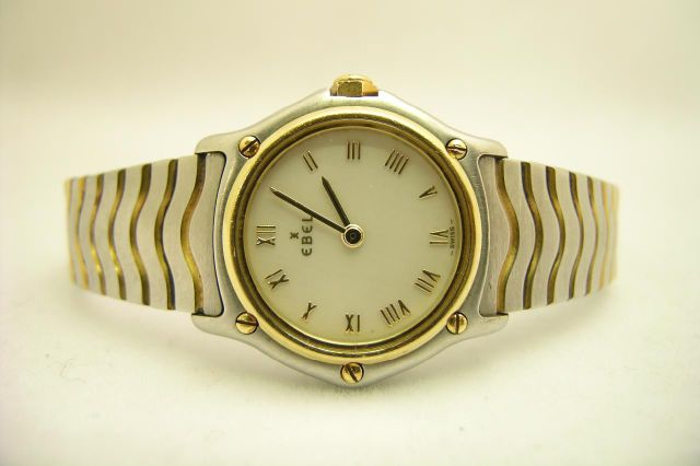 Appraisal: Lady's K Yellow gold and stainless Mini-Ebel Sport Classic watch