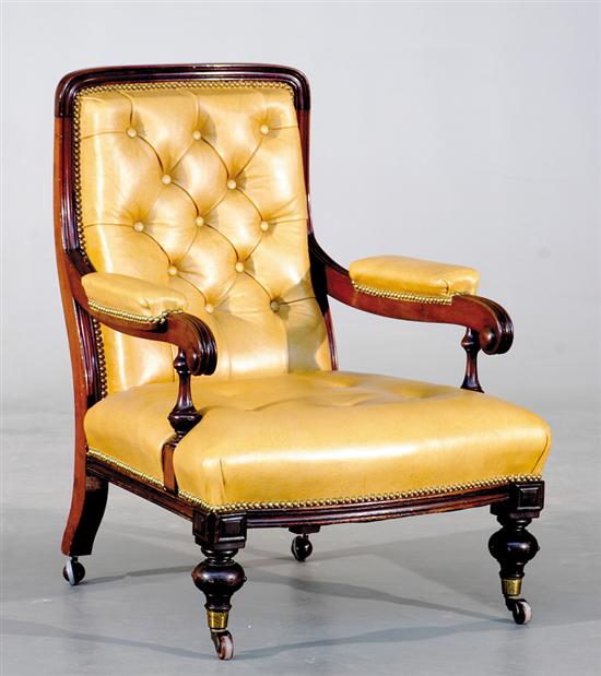 Appraisal: Victorian mahogany and leather library chair circa bead-and-channel frame with