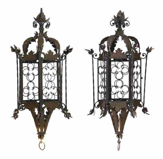 Appraisal: A Pair of Wrought Iron and Tole Oversized Lanterns each