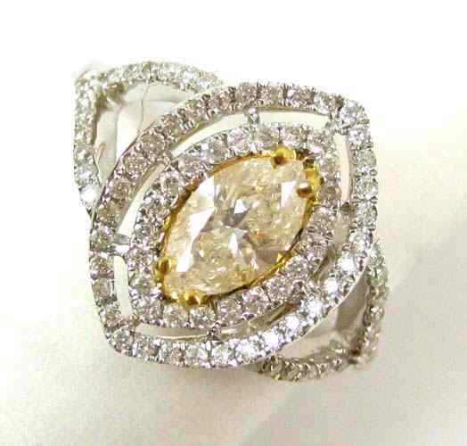 Appraisal: DIAMOND AND EIGHTEEN KARAT GOLD RING featuring a marquise shaped