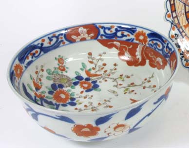 Appraisal: A JAPANESE IMARI PORCELAIN CENTER BOWL hand painted in traditional