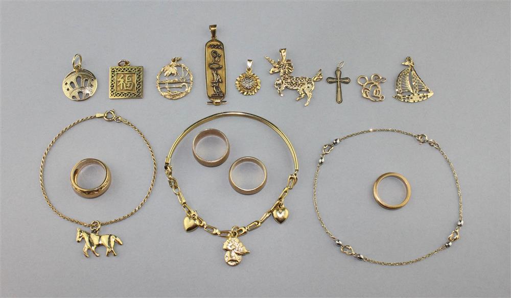 Appraisal: TWO K GOLD BRACELETS NINE LOOSE K GOLD CHARMS FOUR