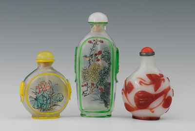 Appraisal: Three Peking Glass Snuff Bottles Including a red and white