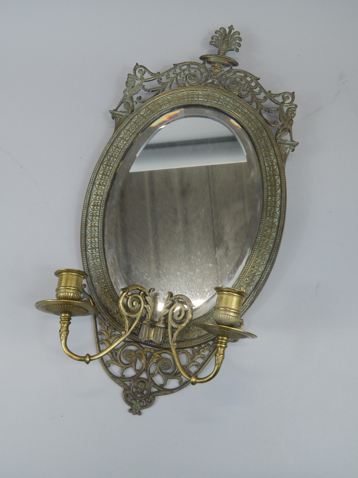 Appraisal: A late thC brass girandole in Neo-classical style decorated with