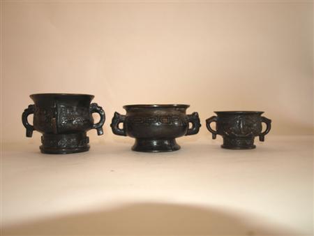 Appraisal: A Chinese bronze two handled censer Ming dynasty or later