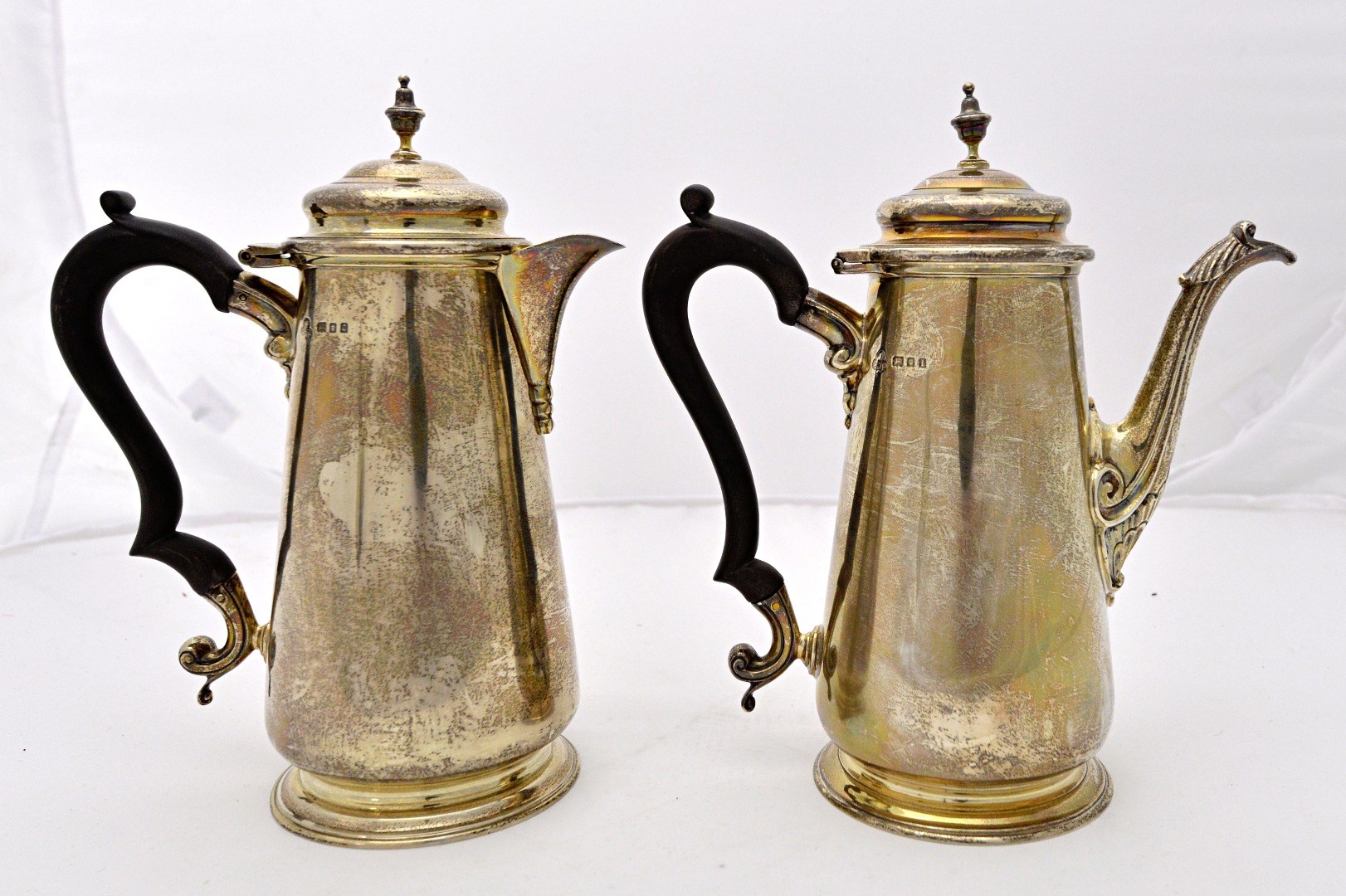 Appraisal: A silver coffee pot with a similar silver hot milk