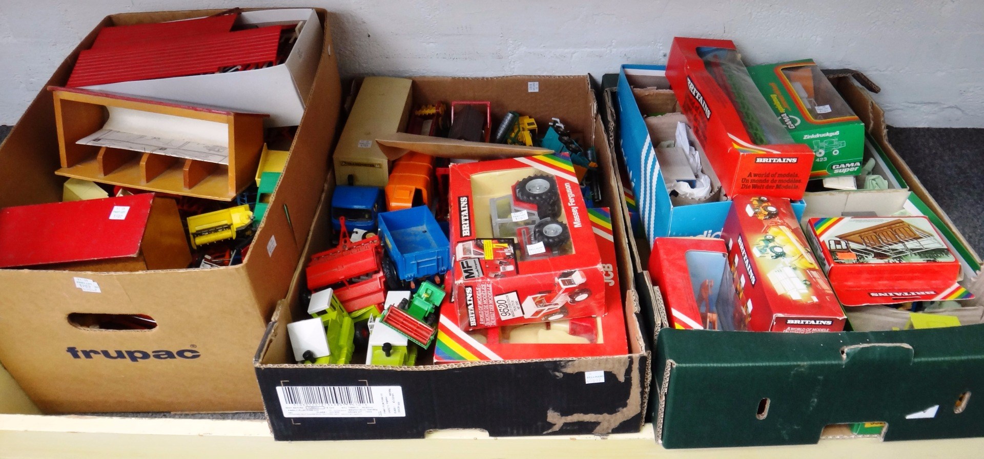 Appraisal: A large quantity of Britains farmyard vehicles animals and accessories