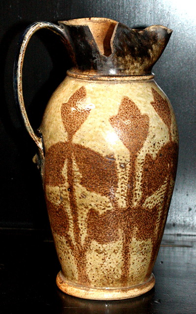 Appraisal: A Martin Brothers stoneware jug circa with stencilled plant design