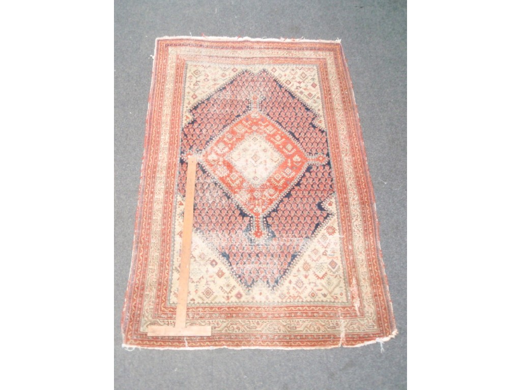 Appraisal: An Eastern rug with medallion on a light ground cm