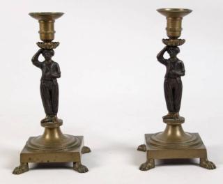 Appraisal: PAIR OF FIGURAL MOUNTED BRONZE CANDLESTICKS PAIR OF FIGURAL MOUNTED