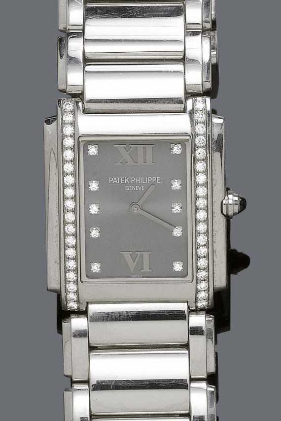 Appraisal: DIAMOND LADY'S WRISTWATCH PATEK PHILIPPE TWENTY- Steel Ref A- Rectangular