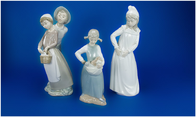 Appraisal: Collection Of Three Nao Figures Young Girl In Her Night