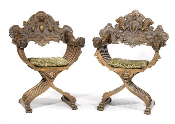 Appraisal: TWO X-FRAME ARMCHAIRS Renaissance Revival Carved walnut