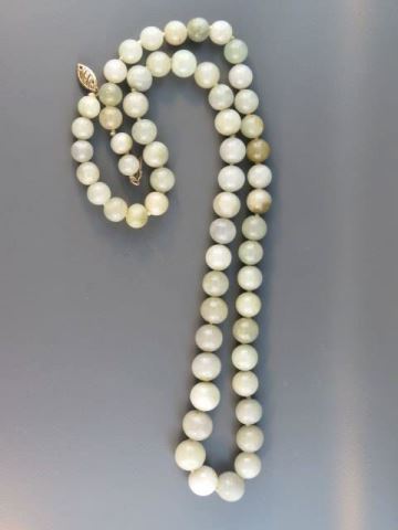 Appraisal: Jade Necklace graduated beads to mm k yellow gold clasp