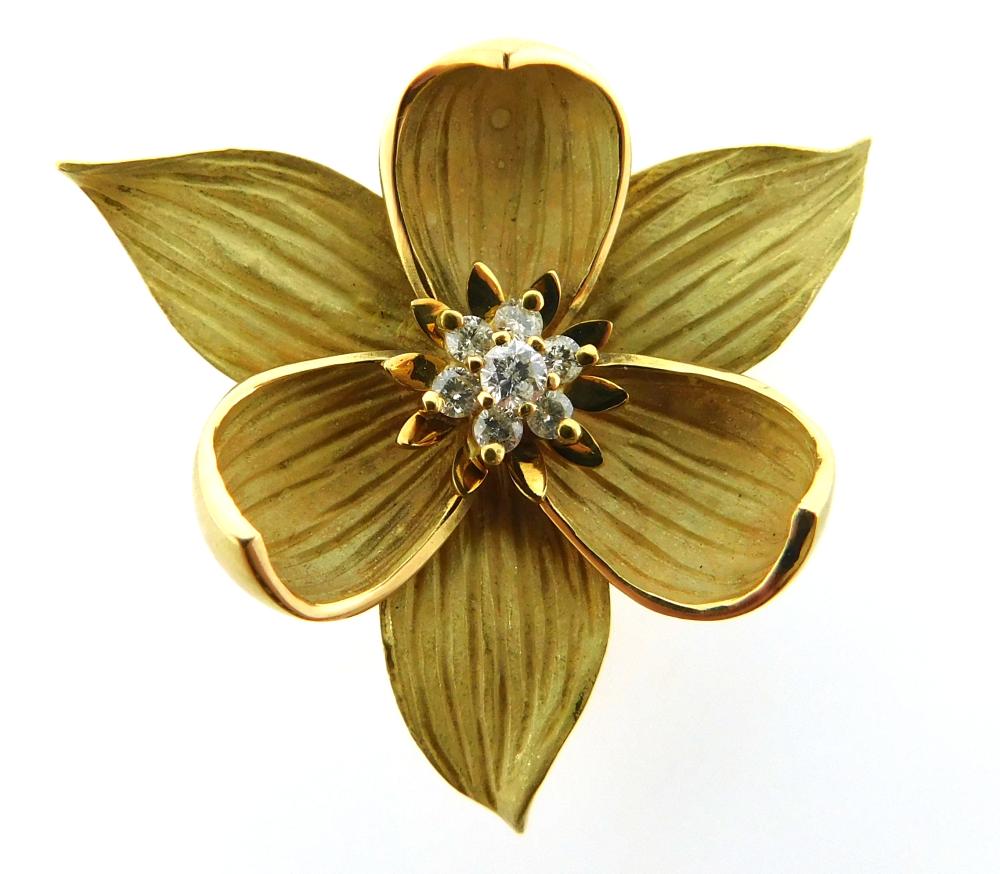 Appraisal: JEWELRY K diamond flower brooch stamped K yellow gold brooch